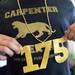 Carpenter Elementary school fifth-grade teacher Sean Slay shows off the gold necklace he made for  a 175th birthday celebration on Friday, April 26, 2013. Melanie Maxwell I AnnArbor.com